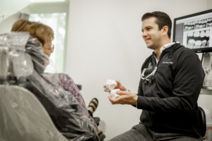 russo smiling with teeth porcelain crowns same day blog post for raleigh dentist